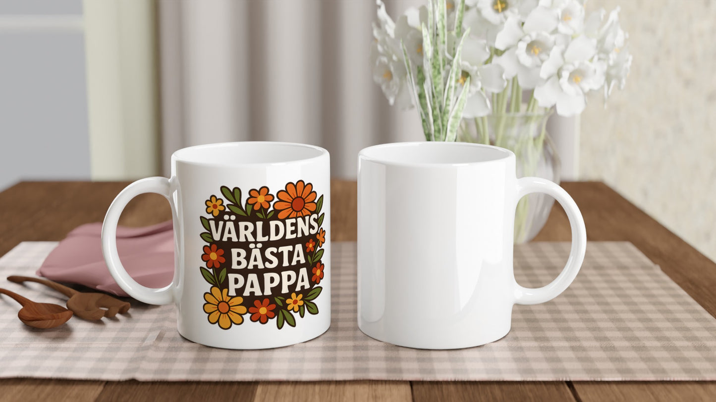 Mugg med 'Världens bästa pappa' inramat av blommor, perfekt för pappans fika. Stilfull och speciell!