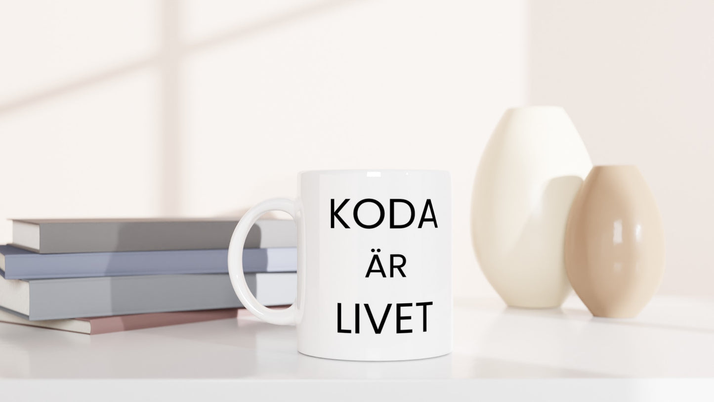 Mugg med texten Koda Livet 6 för alla glada programmerare som vill fira livet.