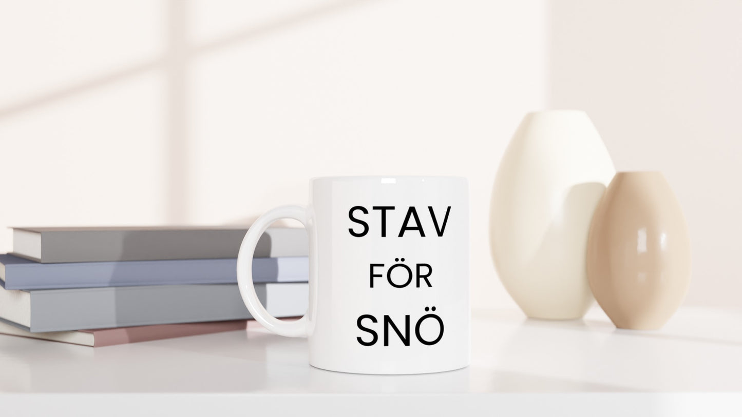 Mugg med humor för stav- och snöälskare.