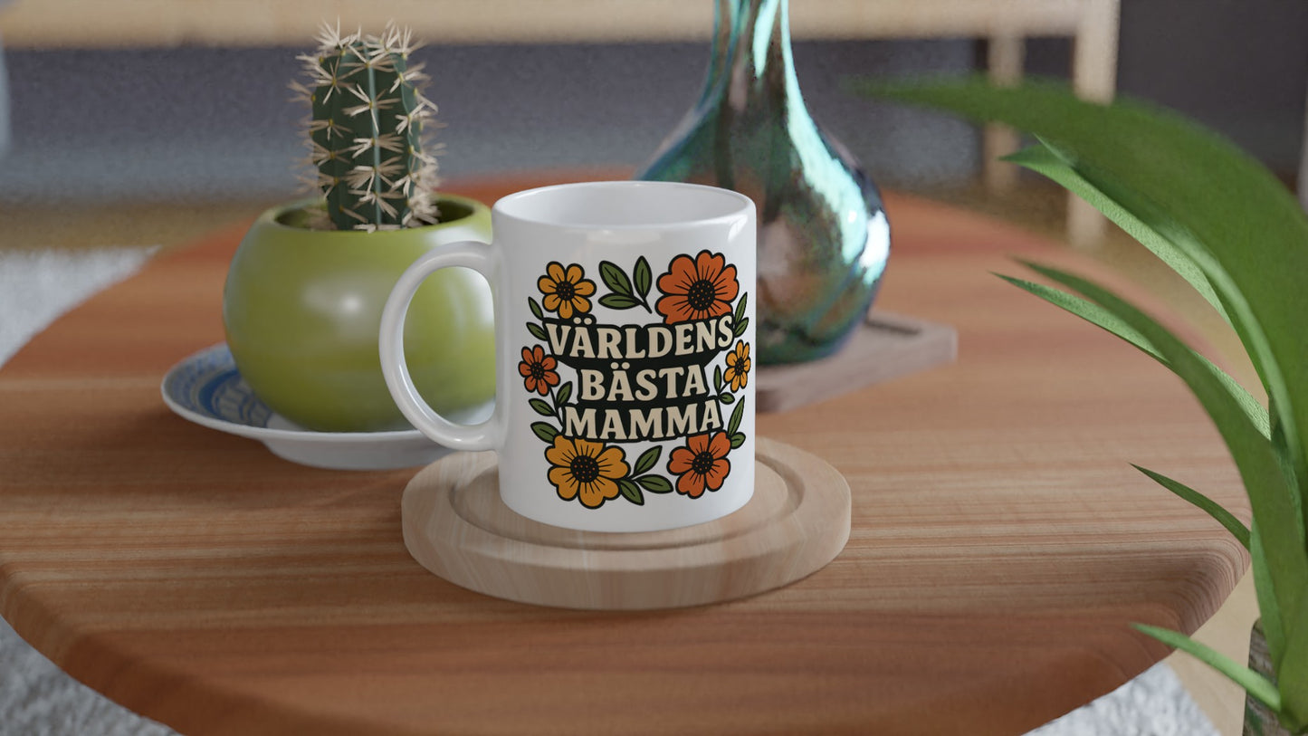 Mugg med blommor i varma toner och kärleksfull text för att fira världens bästa mamma. Blommande Mammas Kärlek.