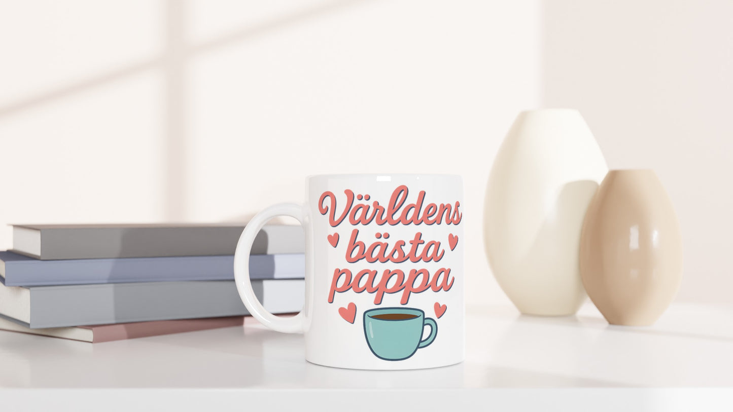 Mugg med texten 'Världens bästa pappa' i mjuka bokstäver. Perfekt present till fars dag!