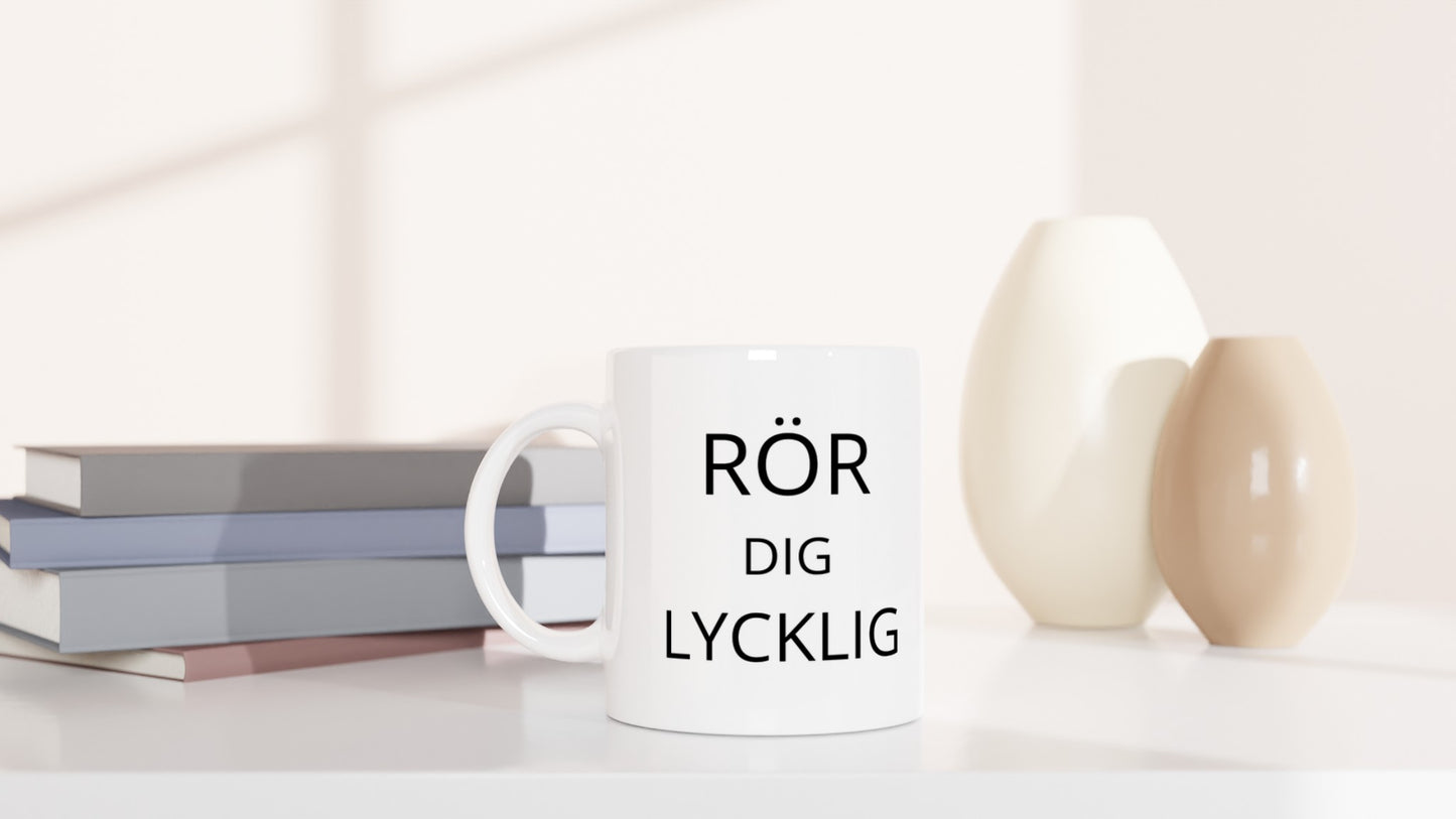 En inspirerande mugg för glädje i köket. Rör Dig Lycklig - för de som älskar att skapa gott.