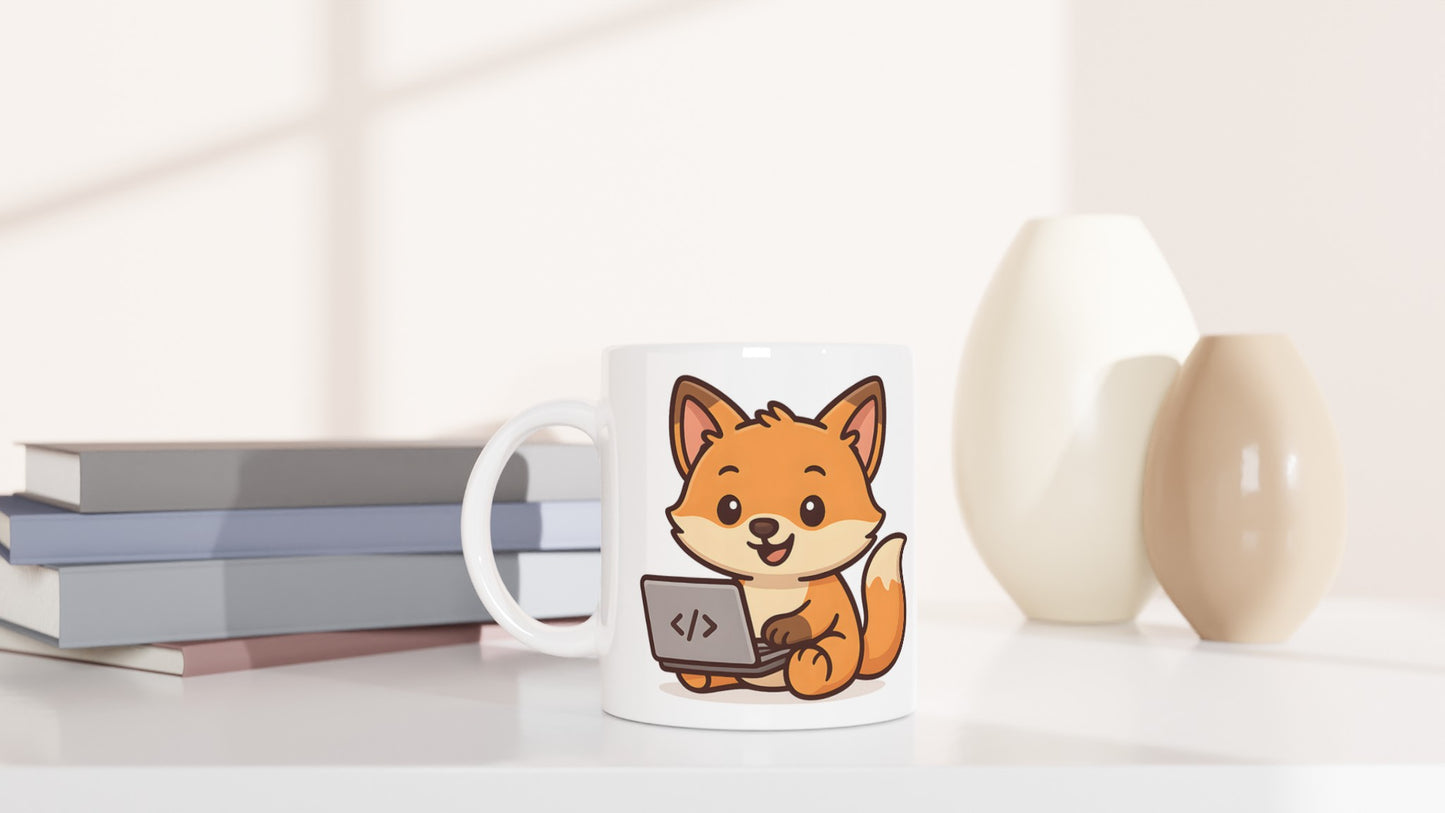 Räv programmerar med entusiasm på datorn för djurälskare & kodälskare - Digital Djurvän