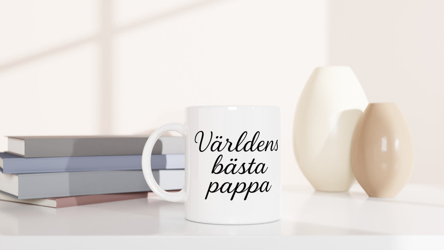 Mugg för pappa i elegant svartvitt med texten 'Världens bästa pappa' i tunn kalligrafisk font. Tidlös hyllning.