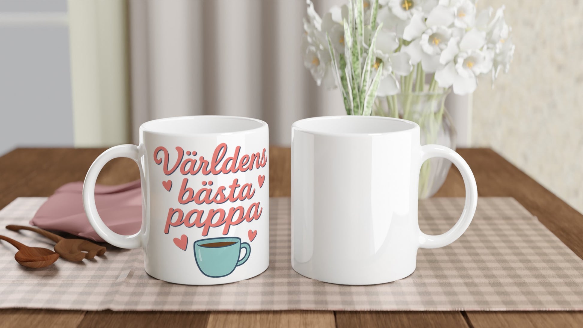 Mugg med texten 'Världens bästa pappa' i mjuka bokstäver. Perfekt present till fars dag!
