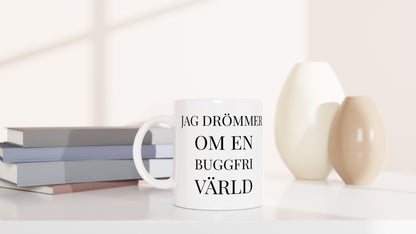 Mugg för programmerare som drömmer om buggfri värld. Hoppfull och inspirerande.
