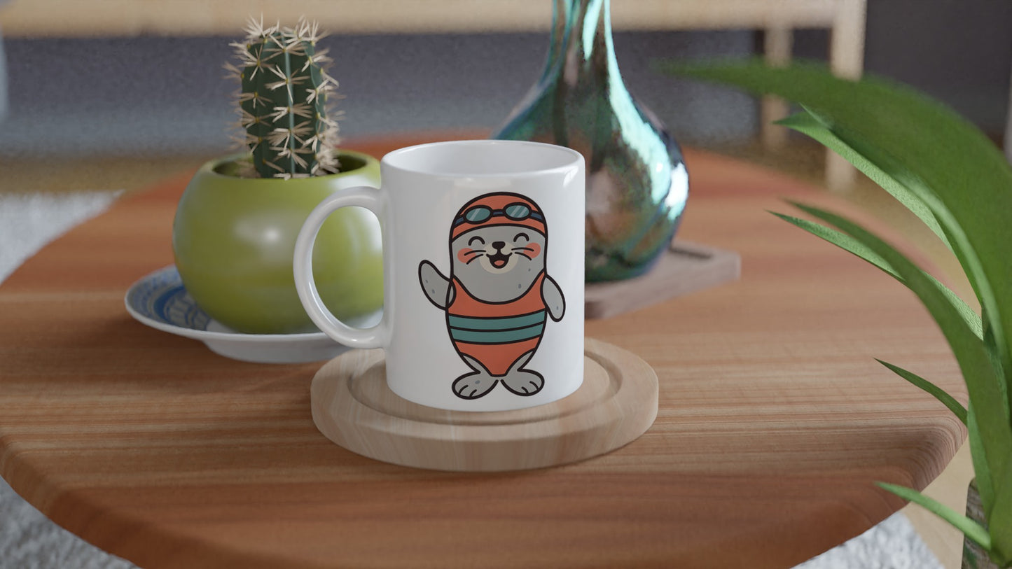 Mugg med glad säl i badkläder, perfekt för en uppiggande start på dagen.