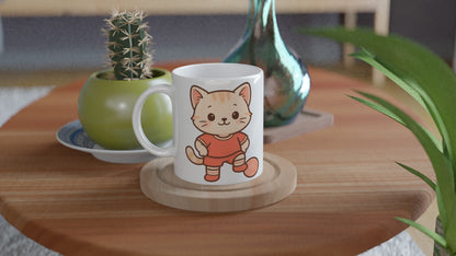 Mugg med rödklädd katt, perfekt för fotbollsfans och kattälskare. Charmigt och unikt motiv.