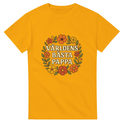 T-shirt med blomstrande mönster och texten 'Världens bästa pappa' i varma toner. En hyllning till pappa i blomstrande stil.