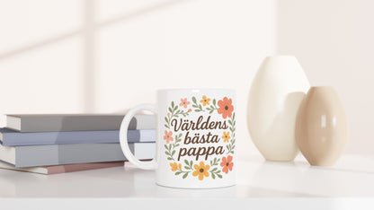 Elegant mugg med texten Världens bästa pappa och blommiga mönster. Perfekt för att visa kärlek och uppskattning.