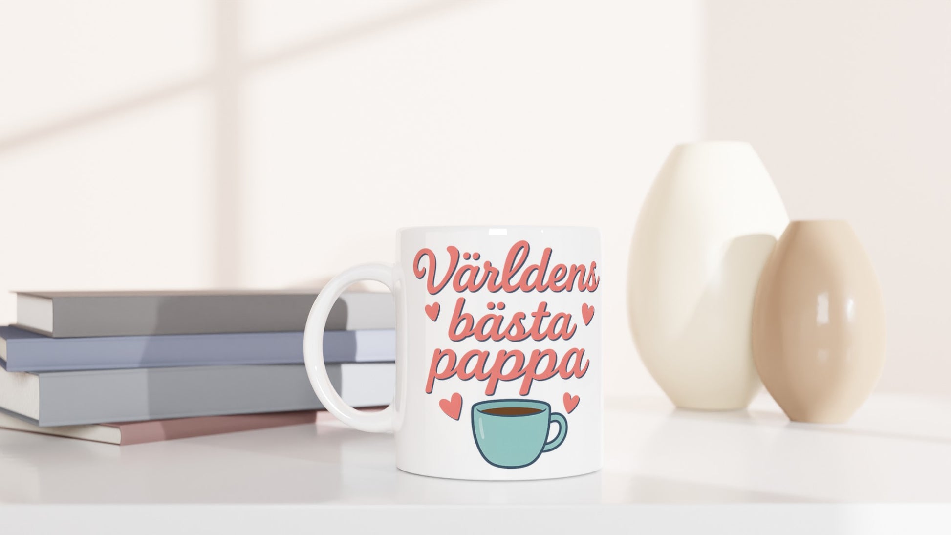 Mugg med texten 'Världens bästa pappa' i mjuka bokstäver. Perfekt present till fars dag!