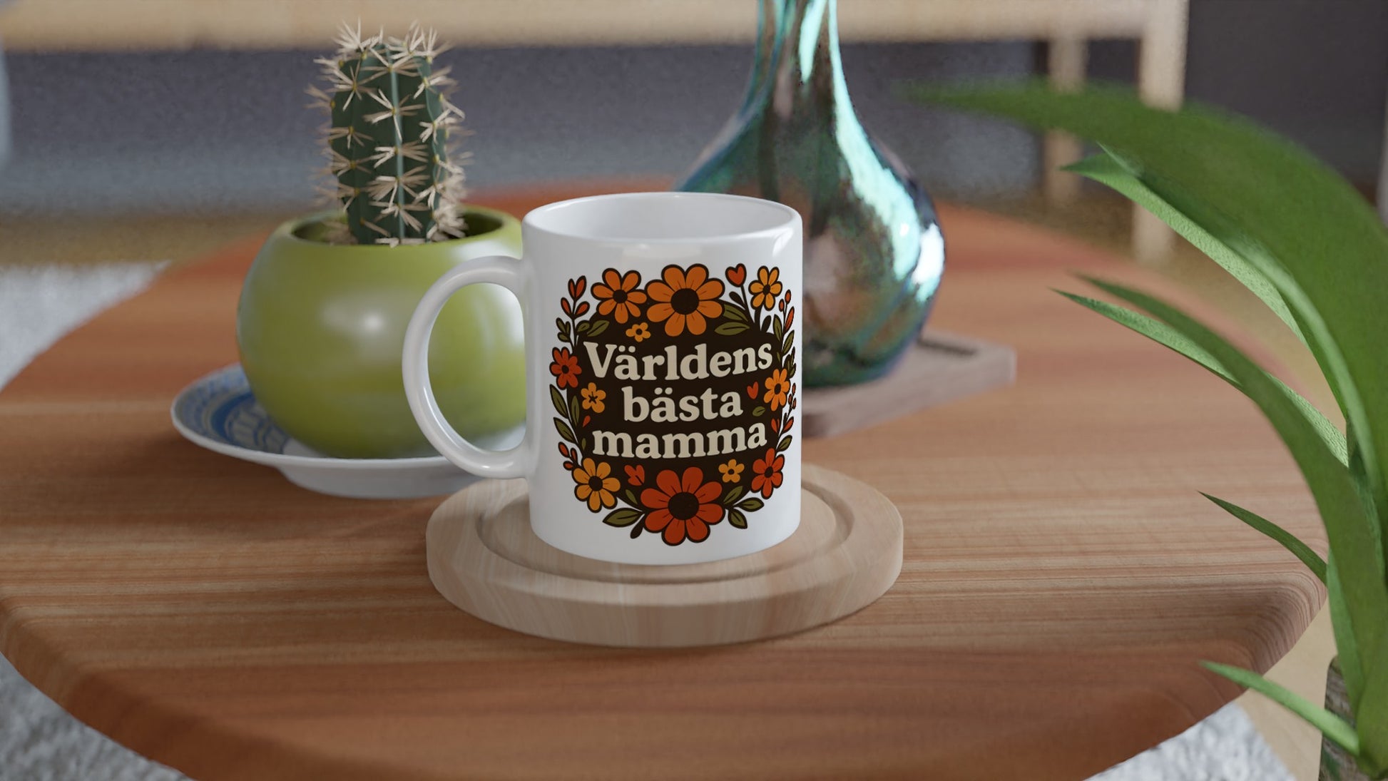 Mugg med texten 'Världens bästa mamma' omgiven av varma blommor. Perfekt gåva till mamma.