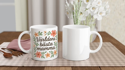 Elegant mugg med blommigt mönster, perfekt för att fira världens bästa mamma med en kopp kaffe.