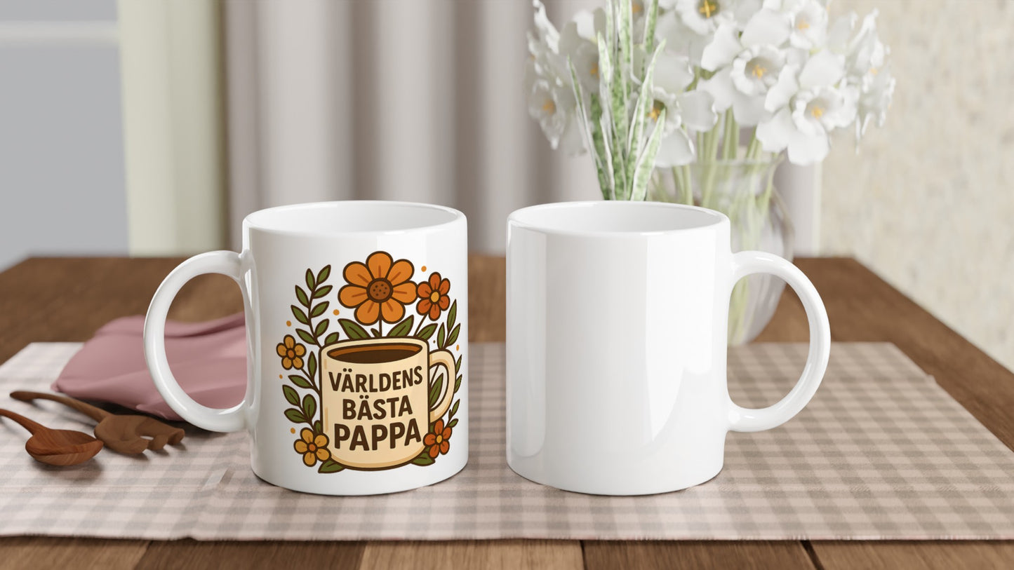 Mugg med 'Världens bästa pappa' och blommande detaljer, perfekt för en varm och inbjudande start på dagen.