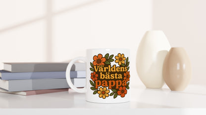 Mugg med blommor och texten 'Världens bästa pappa' för en extra varm kaffestund.
