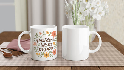 Elegant mugg med texten Världens bästa pappa och blommiga mönster. Perfekt för att visa kärlek och uppskattning.