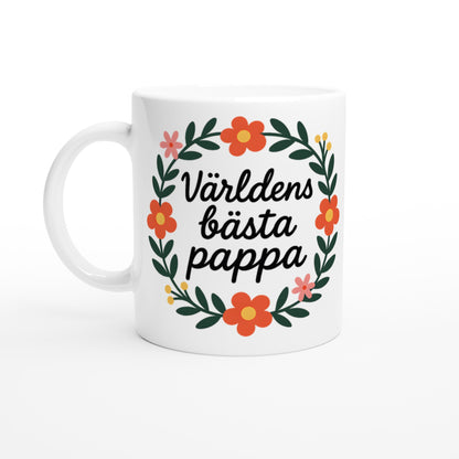 Mugg med texten 'Världens bästa pappa' i blomsterkrans, handskriven stil. Visa uppskattning.