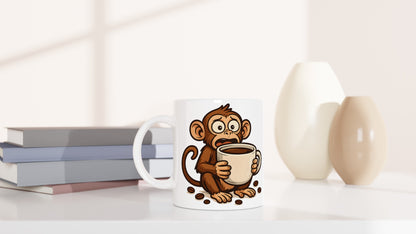 Rolig kaffekoppsapa för kaffekonässörer. Perfekt för kaffebordet eller som present.