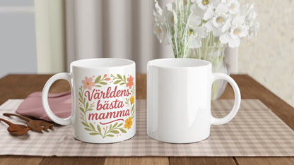Mugg med texten 'Världens bästa mamma' och blommor som kramar. Perfekt för den kärleksfulla mamman!