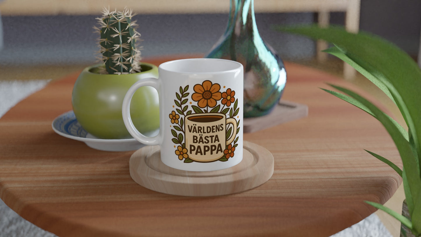 Mugg med 'Världens bästa pappa' och blommande detaljer, perfekt för en varm och inbjudande start på dagen.