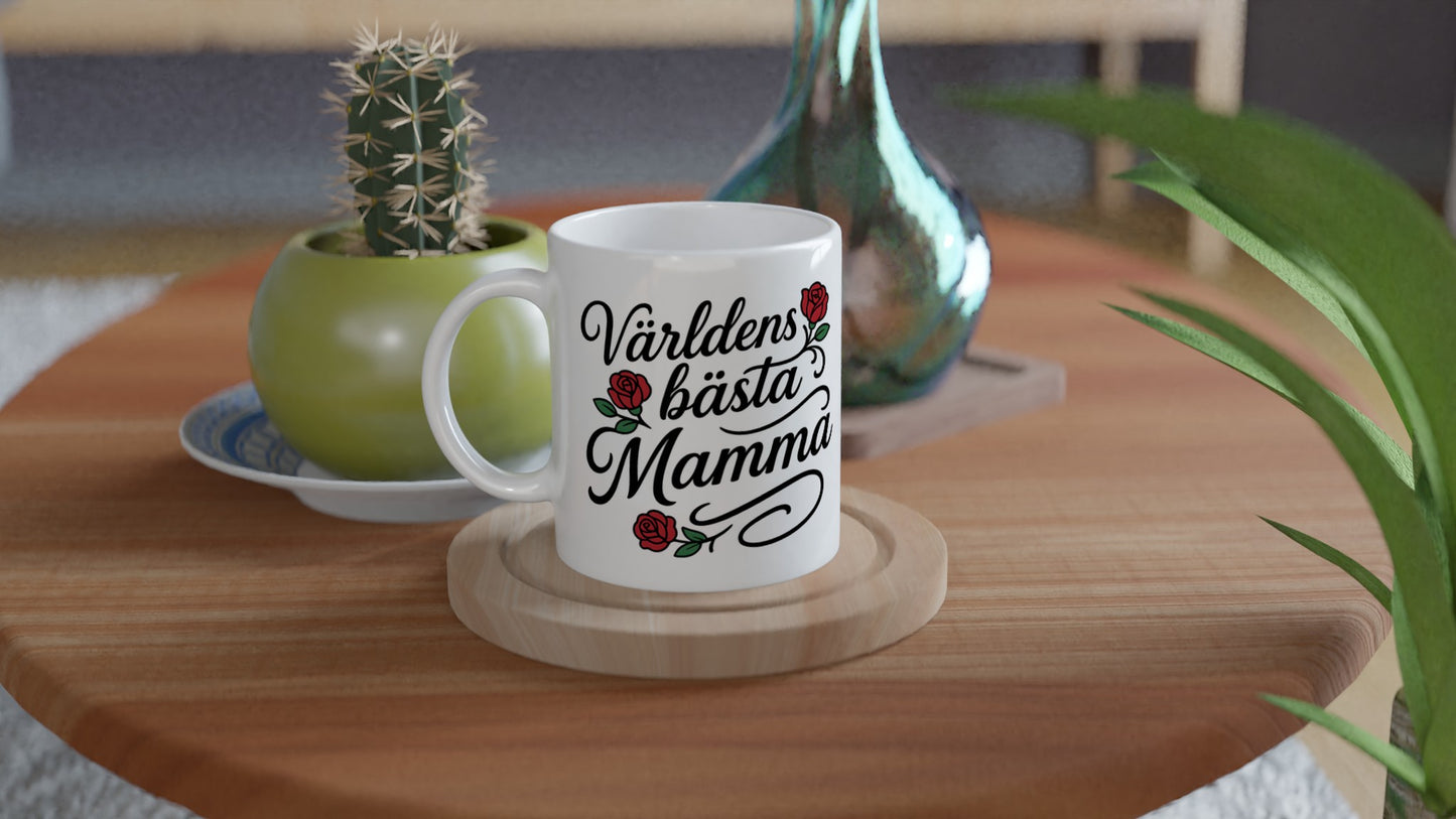 Mugg med elegant typografi och subtila rosor, perfekt för att fira världens bästa mamma. Idealisk för morgonkaffet!