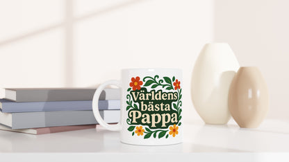 Mugg med florala element och texten Världens bästa pappa. Stilfull och mjuk design för en balanserad känsla.